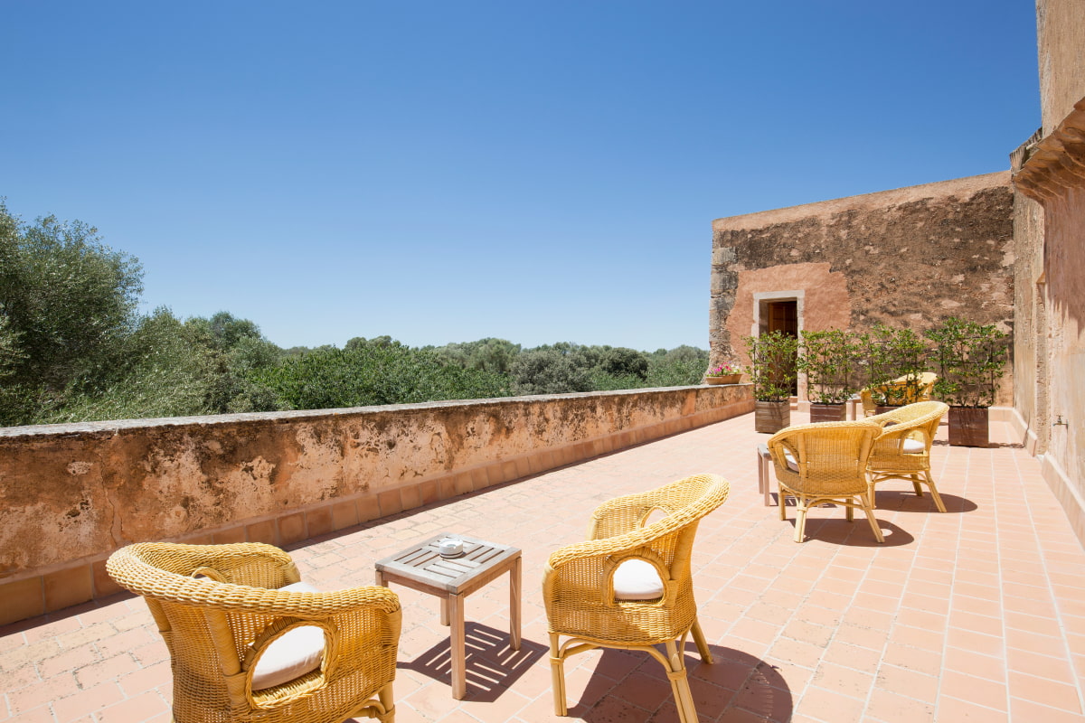 Large outdoor terrace with views of the countryside