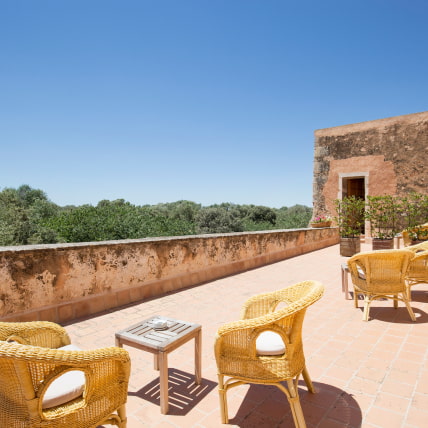 Large outdoor terrace with views of the countryside